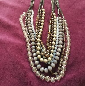 Glass Bead necklace. Blue, Brown, and Silver.